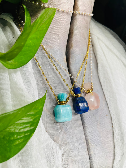 Crystal perfume bottle pendant necklace. 